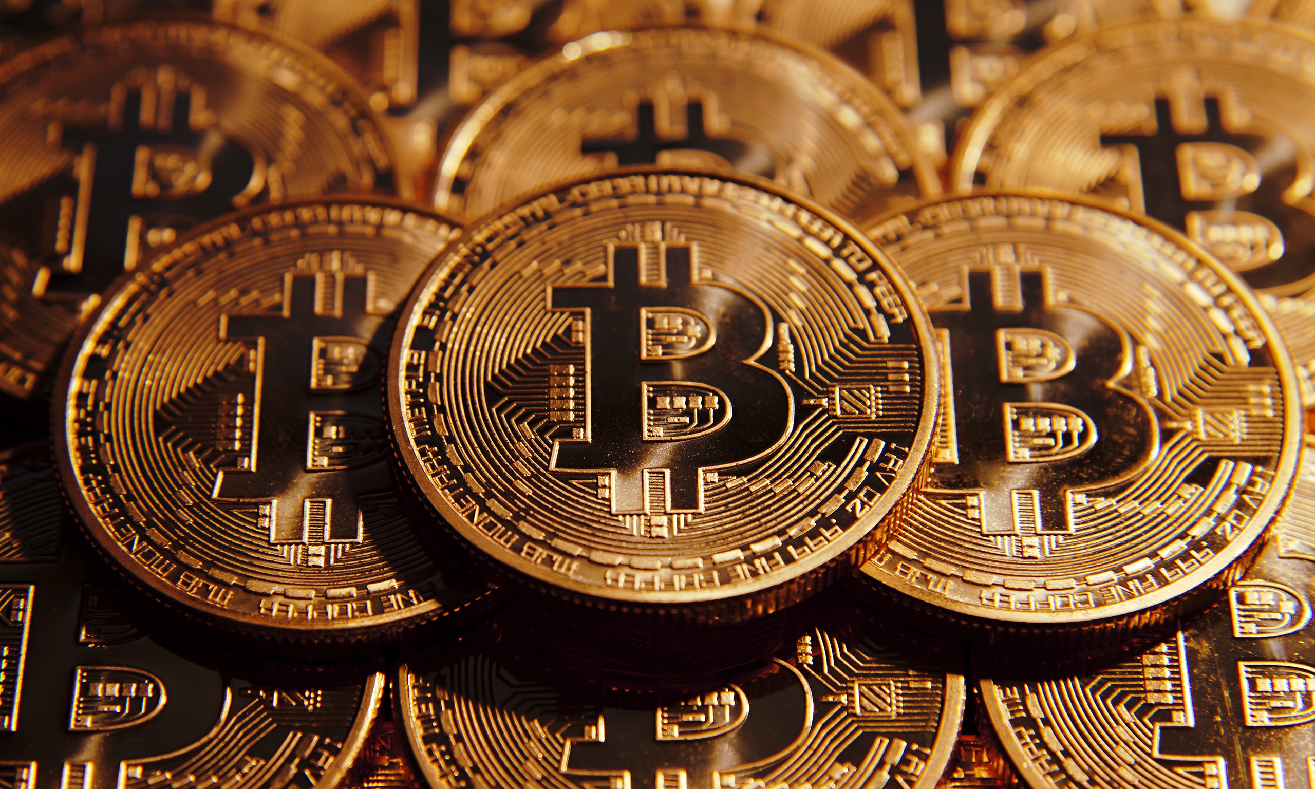 Bitcoin dips below $10,000