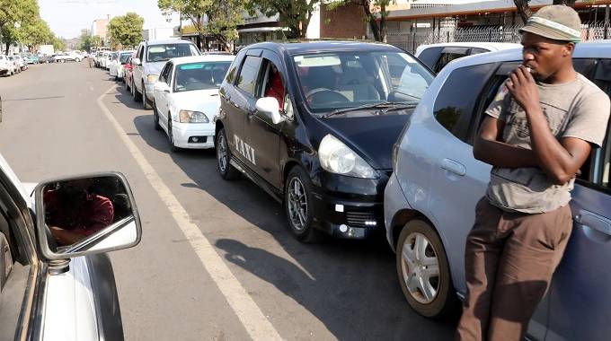 Long fuel queues blamed on panic buying