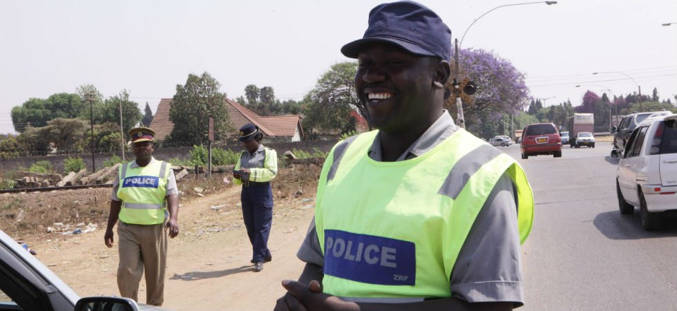 Zimbabwe cops training to smile at roadblocks